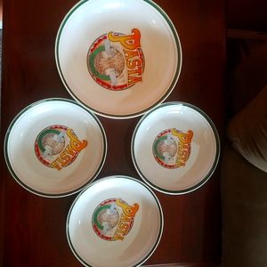 Set of 3 pasta bowls with serving dish.
